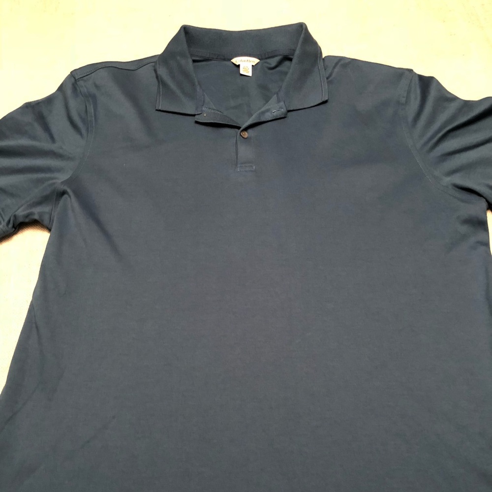 Calvin Klein blue polo size large